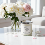 Load image into Gallery viewer, 2 Wick hand poured Sweet Grace Candle labeled 'Sweet Grace' next to a vase of white and pink flowers on a table. Southern Charm Farmhouse.
