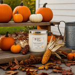 Load image into Gallery viewer, Hand poured Candle labeled 'Toasted Pumpkin Spice' surrounded by pumpkins, corn, and leaves on a wooden surface. Southern Charm Farmhouse.
