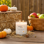 Load image into Gallery viewer, Hand poured Candle with a label surrounded by pumpkins, hay, and apples on a wooden surface. Southern Charm Farmhouse.
